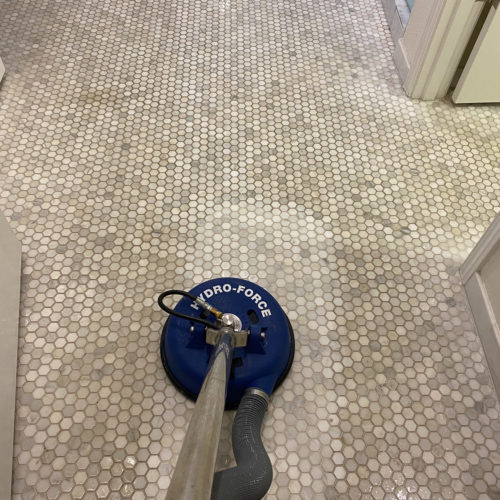 Eds-tile-cleaning-with-vaccum